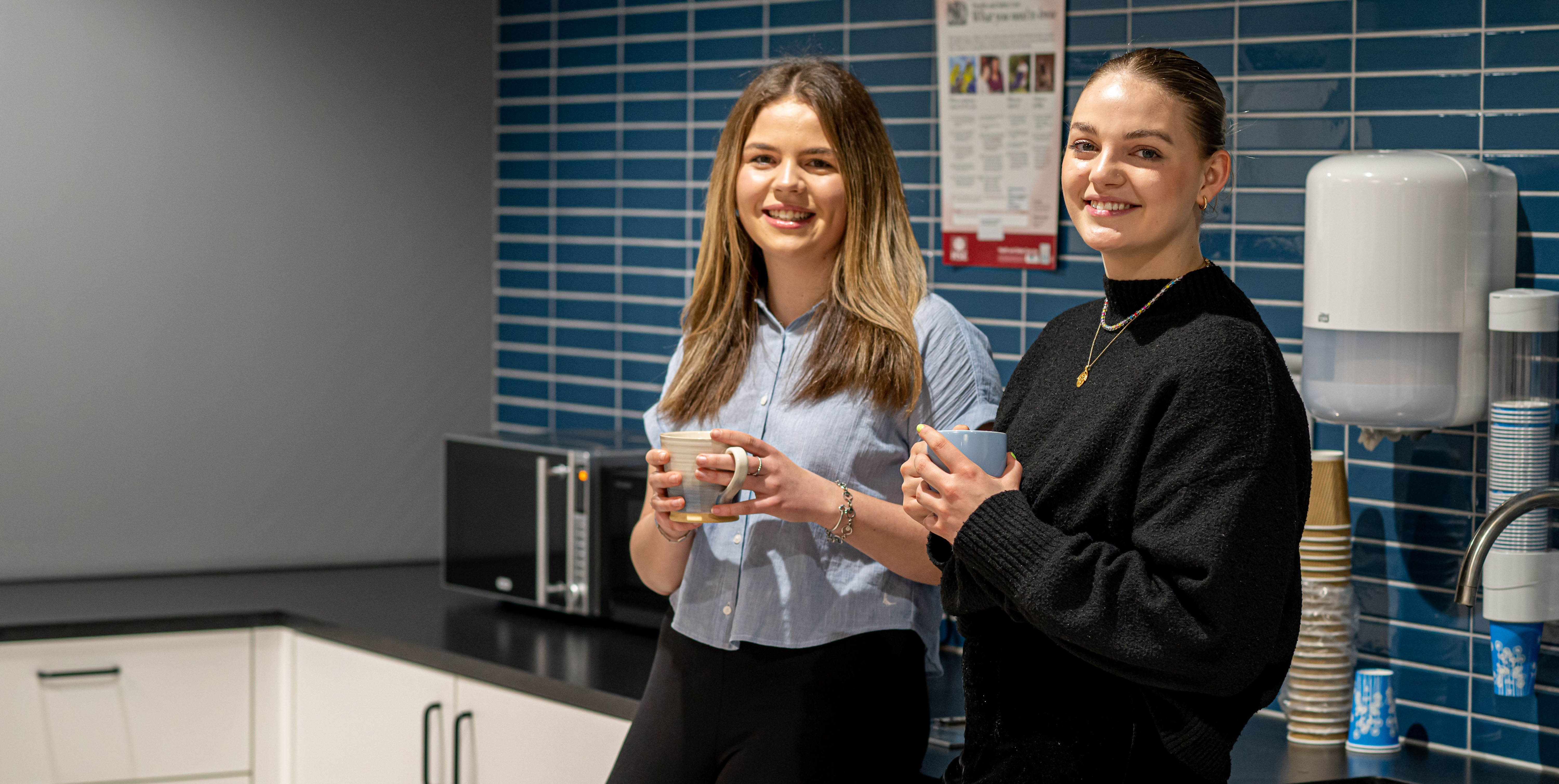 Two females looking at the camera